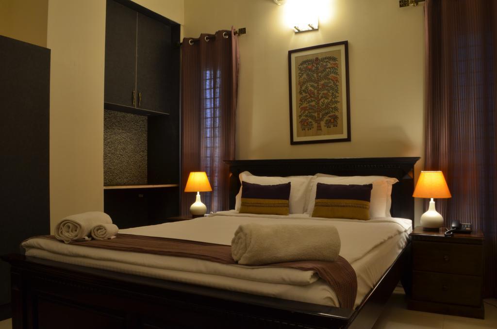 Luxtay Suites Bengaluru Szoba fotó