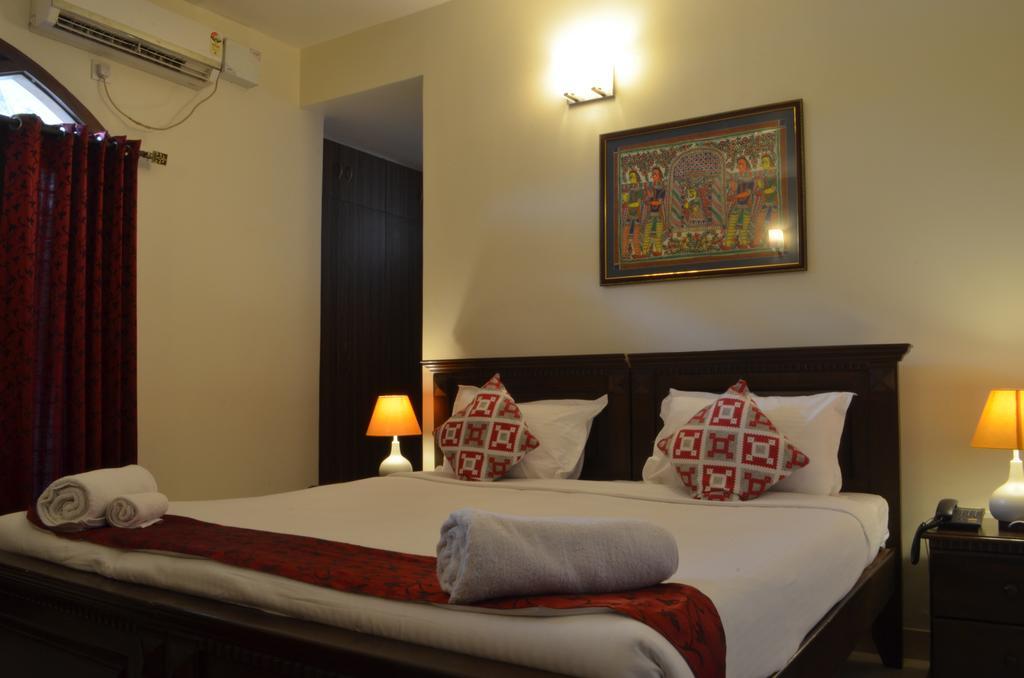 Luxtay Suites Bengaluru Szoba fotó