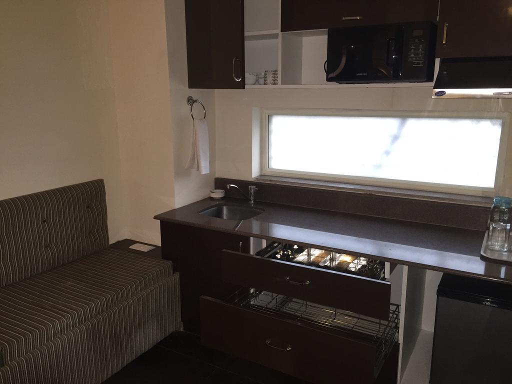 Luxtay Suites Bengaluru Szoba fotó
