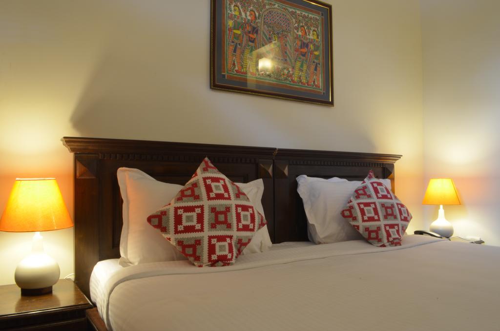 Luxtay Suites Bengaluru Szoba fotó