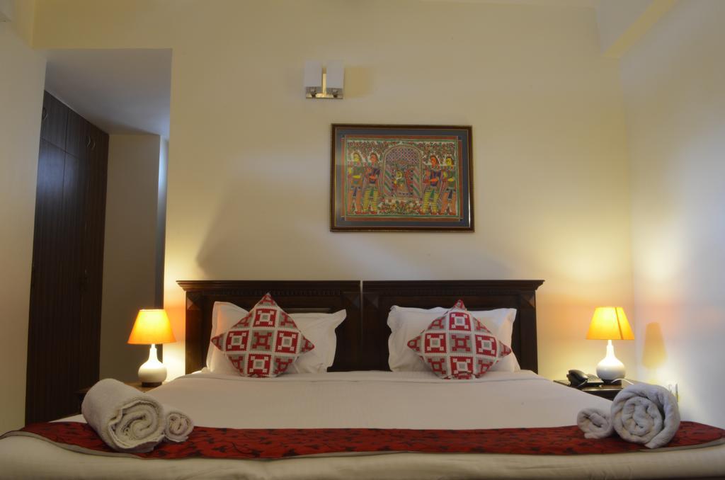 Luxtay Suites Bengaluru Szoba fotó
